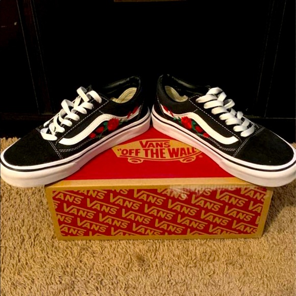 black vans with roses on the side